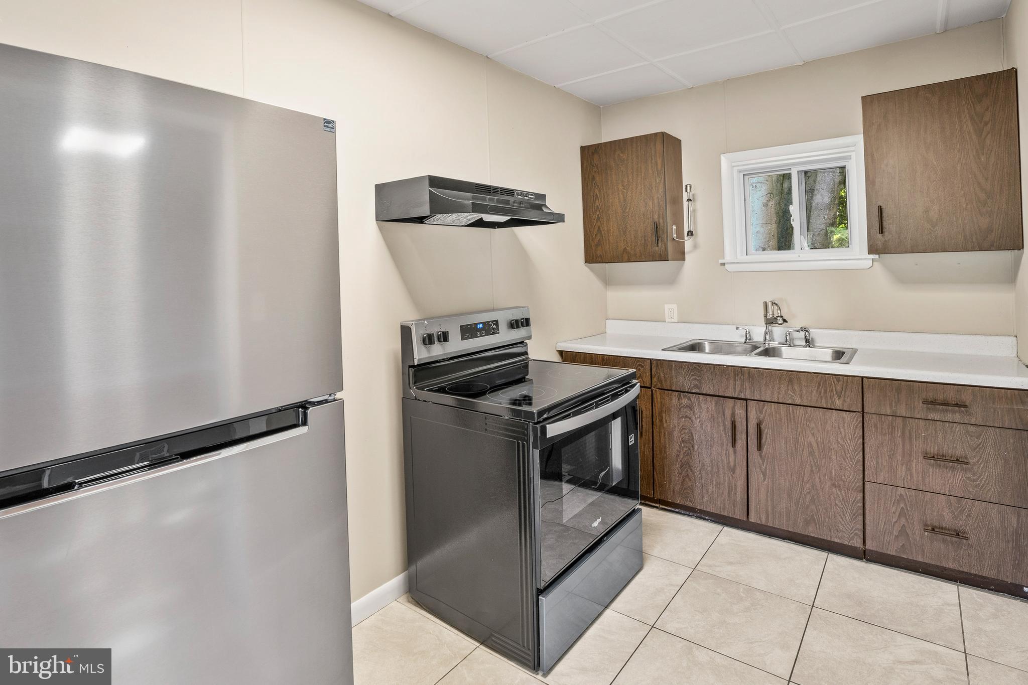 83 Rutgers Road Pennsville, NJ 08070 - Photo 9 of 23 a kitchen with a sink appliances and cabinets