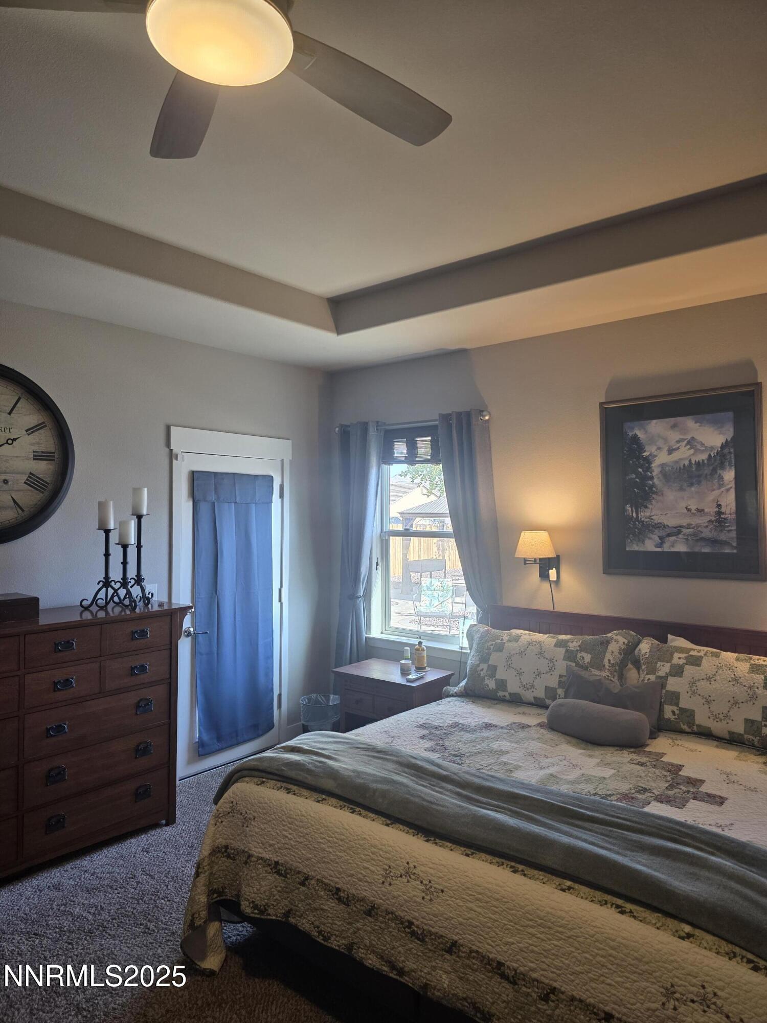 1145 Cheatgrass Drive, Unit BETWEEN DAFFODIL AND ALMOND CREEK Dayton, NV 89403 - Photo 16 of 40 a bedroom with a bed and a dresser