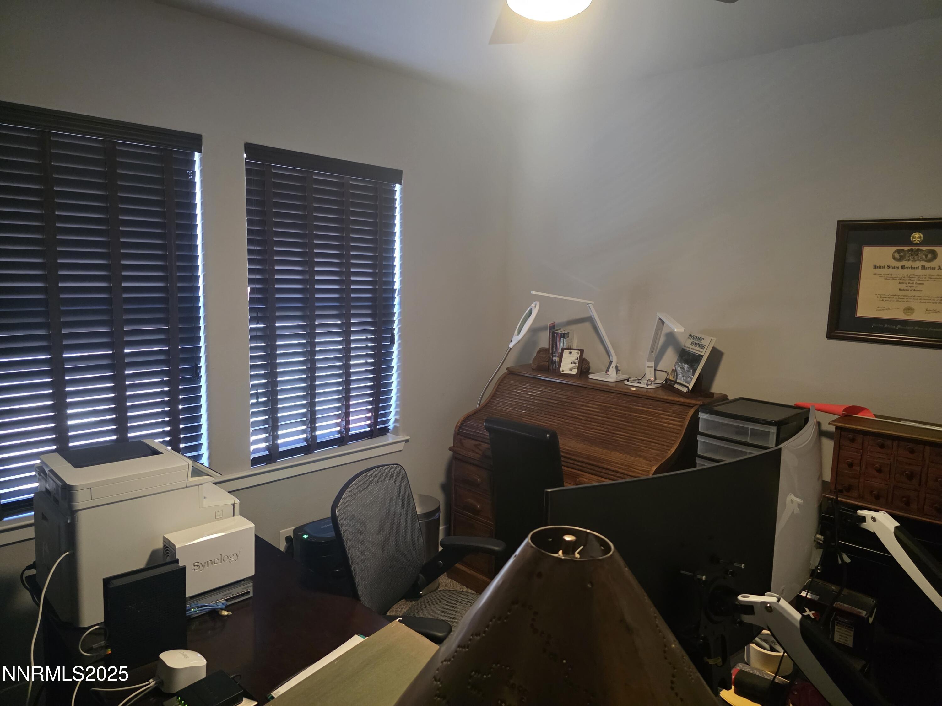 1145 Cheatgrass Drive, Unit BETWEEN DAFFODIL AND ALMOND CREEK Dayton, NV 89403 - Photo 19 of 40 a room with furniture and window