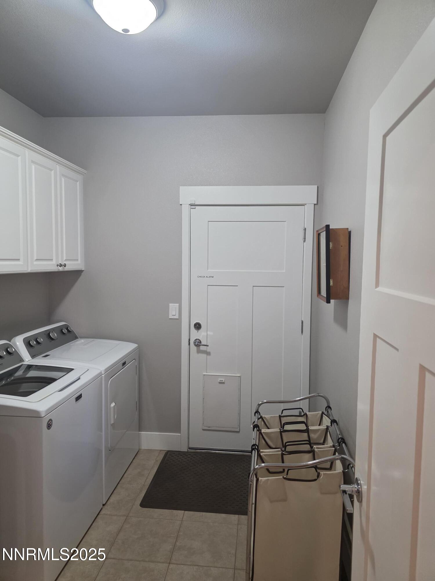 1145 Cheatgrass Drive, Unit BETWEEN DAFFODIL AND ALMOND CREEK Dayton, NV 89403 - Photo 23 of 40 a room with storage and utility