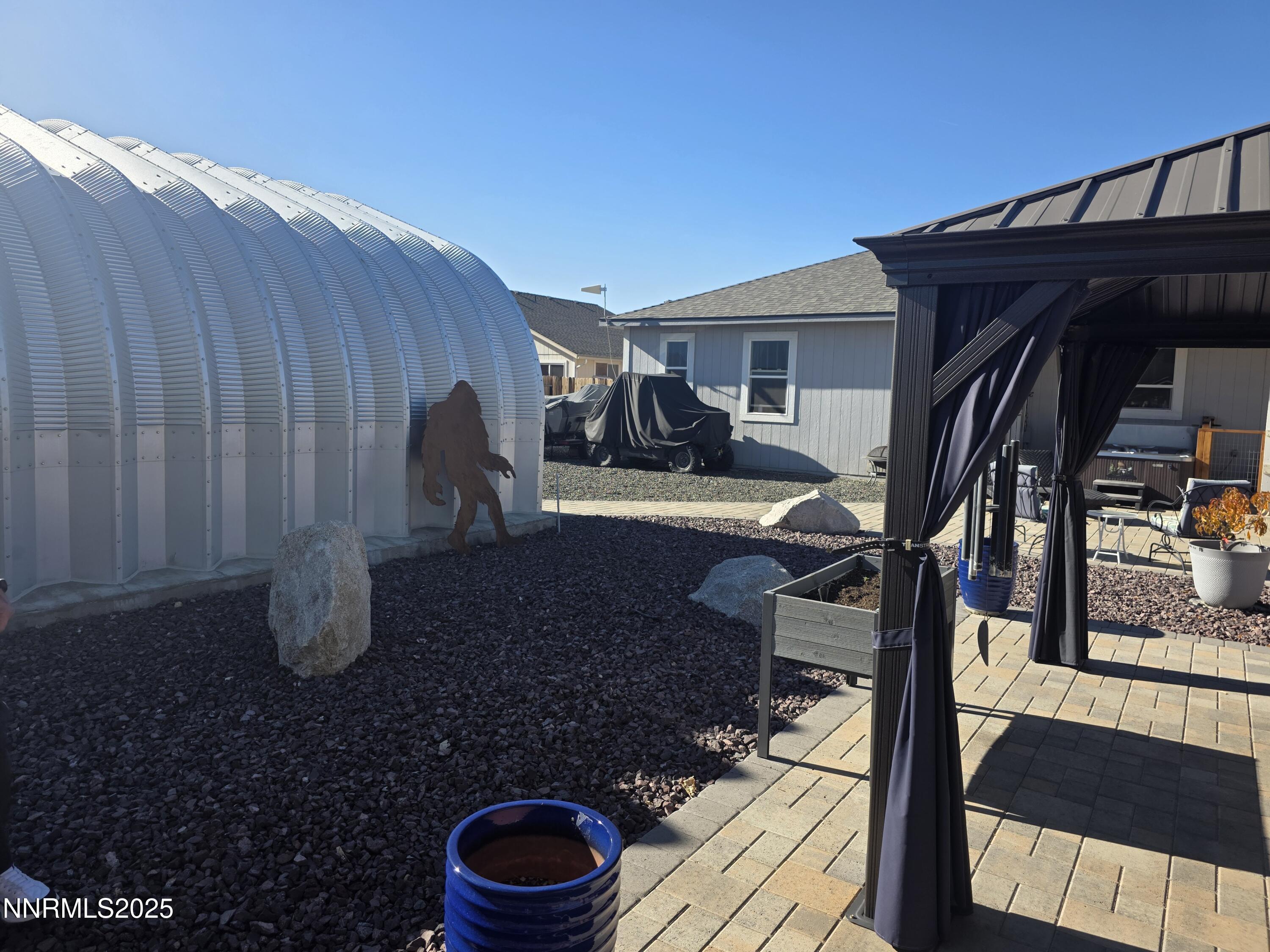 1145 Cheatgrass Drive, Unit BETWEEN DAFFODIL AND ALMOND CREEK Dayton, NV 89403 - Photo 33 of 40 a view of outdoor space and patio