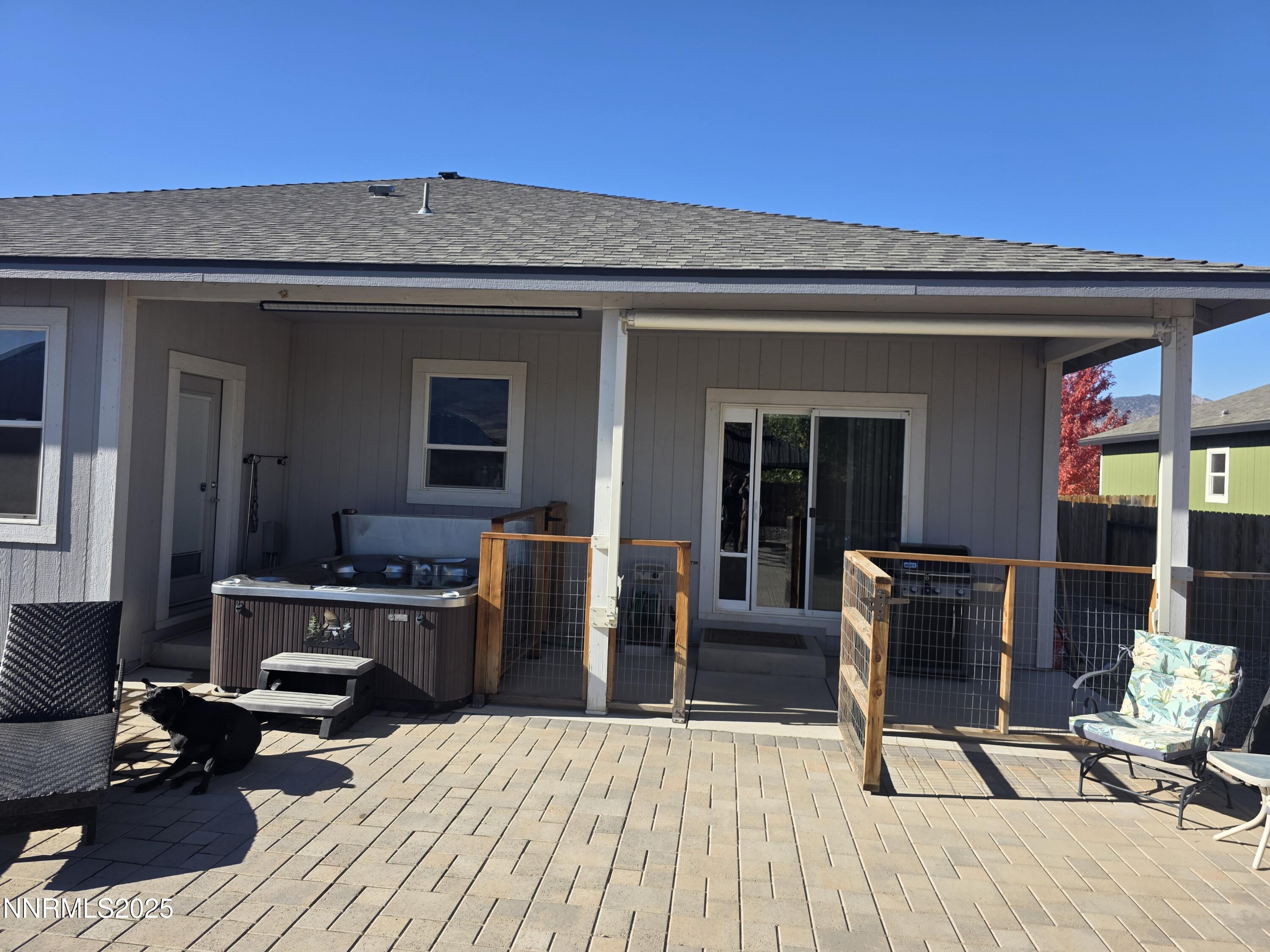 1145 Cheatgrass Drive, Unit BETWEEN DAFFODIL AND ALMOND CREEK Dayton, NV 89403 - Photo 35 of 40 a view of a dinning room with furniture and windows