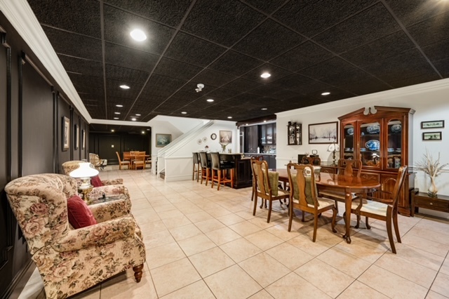 115 Dickens Road Northfield, IL 60093 - Photo 21 of 24 a living room with furniture and a large window