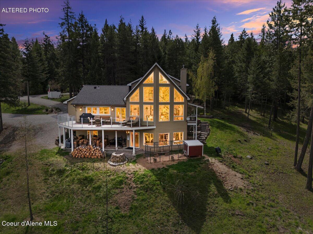 4177 East Eagles Mere Road Harrison, ID 83833 - Photo 2 of 100 01-Twilight Aerial Back of Home