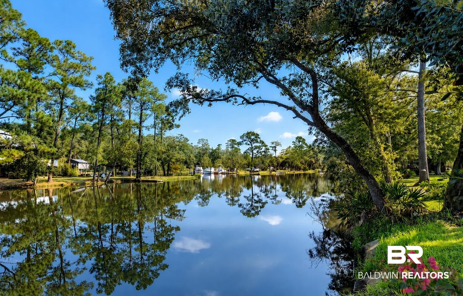 9825 Wolf Creek Ridge Elberta, AL 36530 - Photo 71 of 76 Serene waterfront setting with a calm body of water reflecting the surrounding landscape