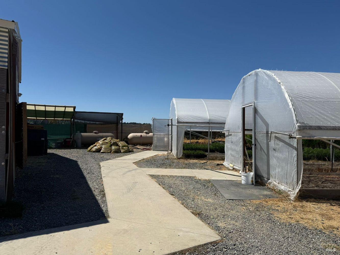 19450 Tomki Road Willits, CA 95490 - Photo 12 of 37 a bedroom with a bed and a fireplace
