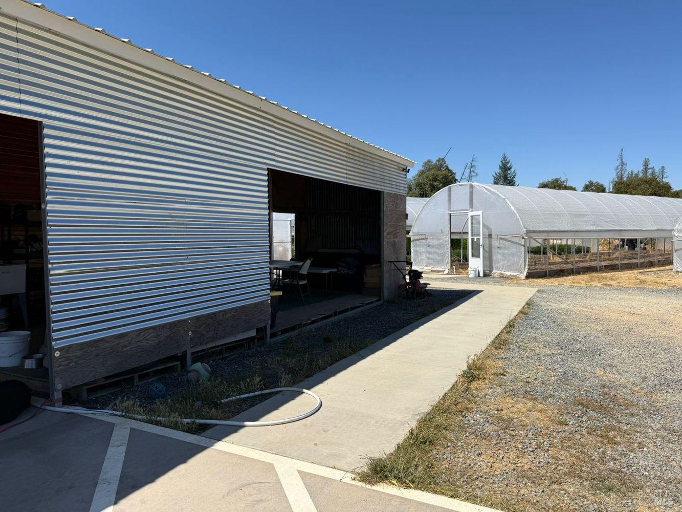 19450 Tomki Road Willits, CA 95490 - Photo 14 of 37 a view of a backyard with sitting area