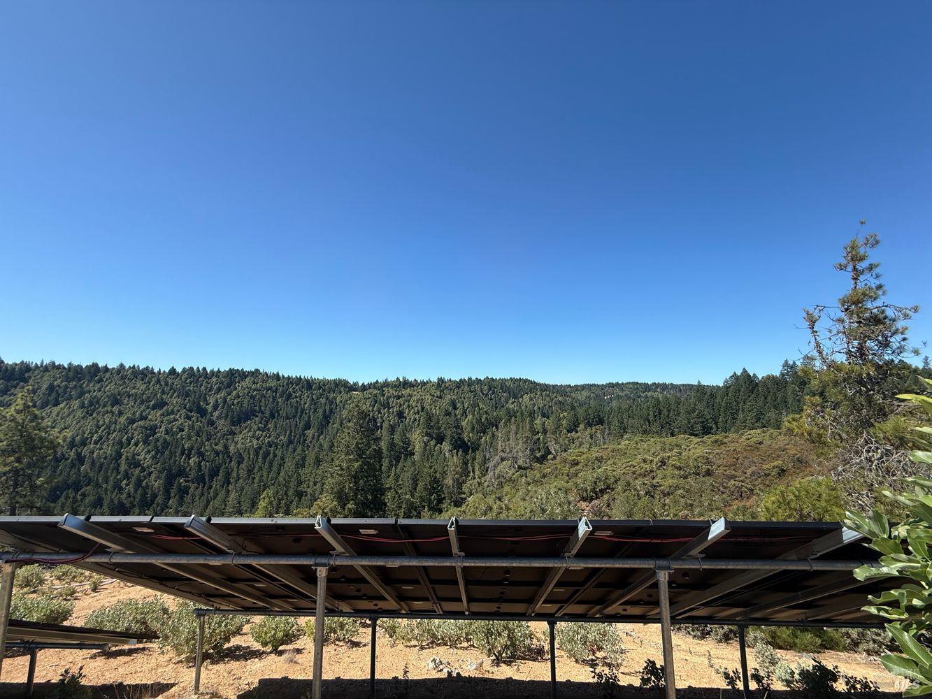 19450 Tomki Road Willits, CA 95490 - Photo 31 of 37 a view of a backyard with mountain view and mountain view