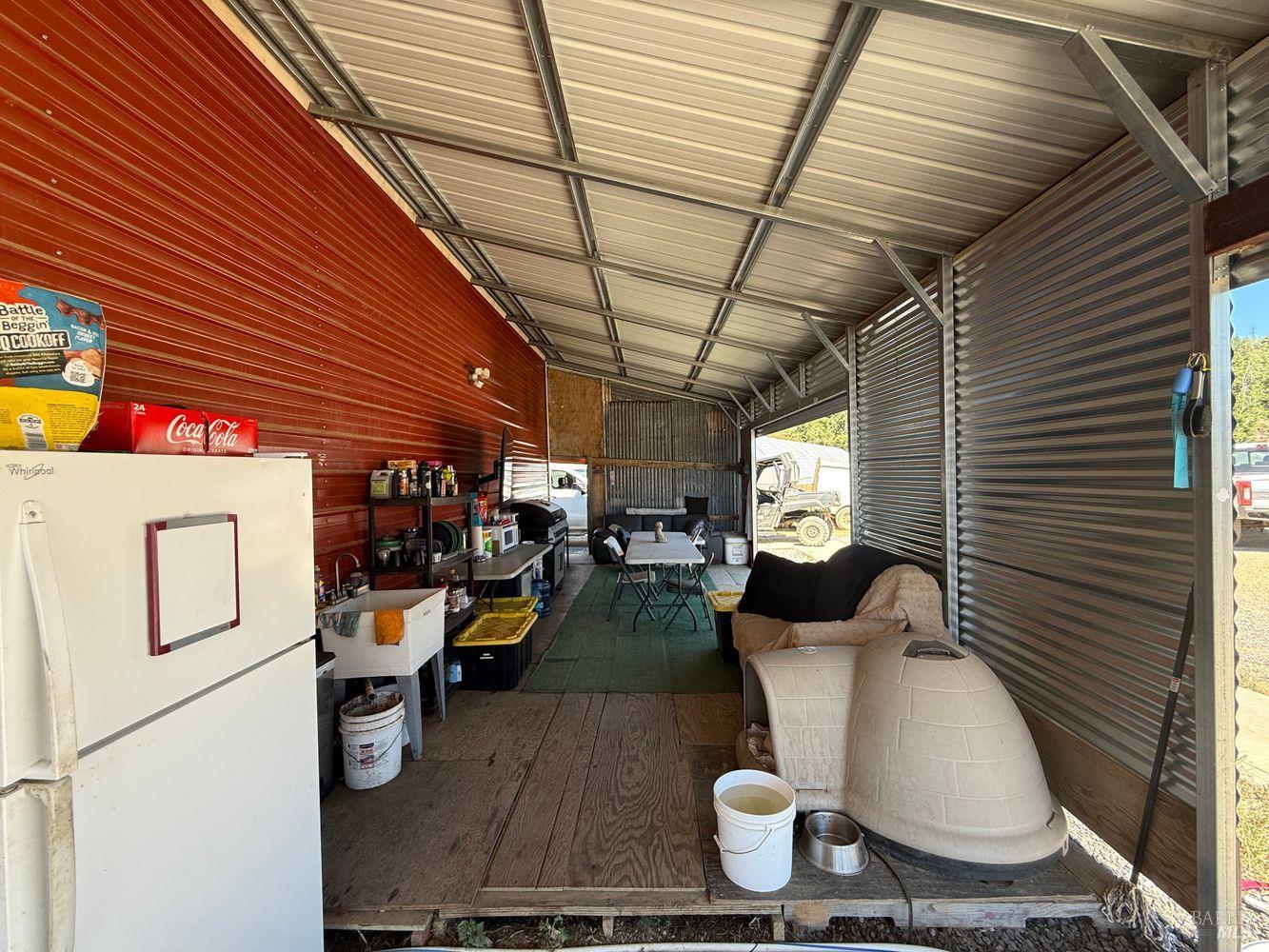 19450 Tomki Road Willits, CA 95490 - Photo 9 of 37 a view of a patio with table and chairs