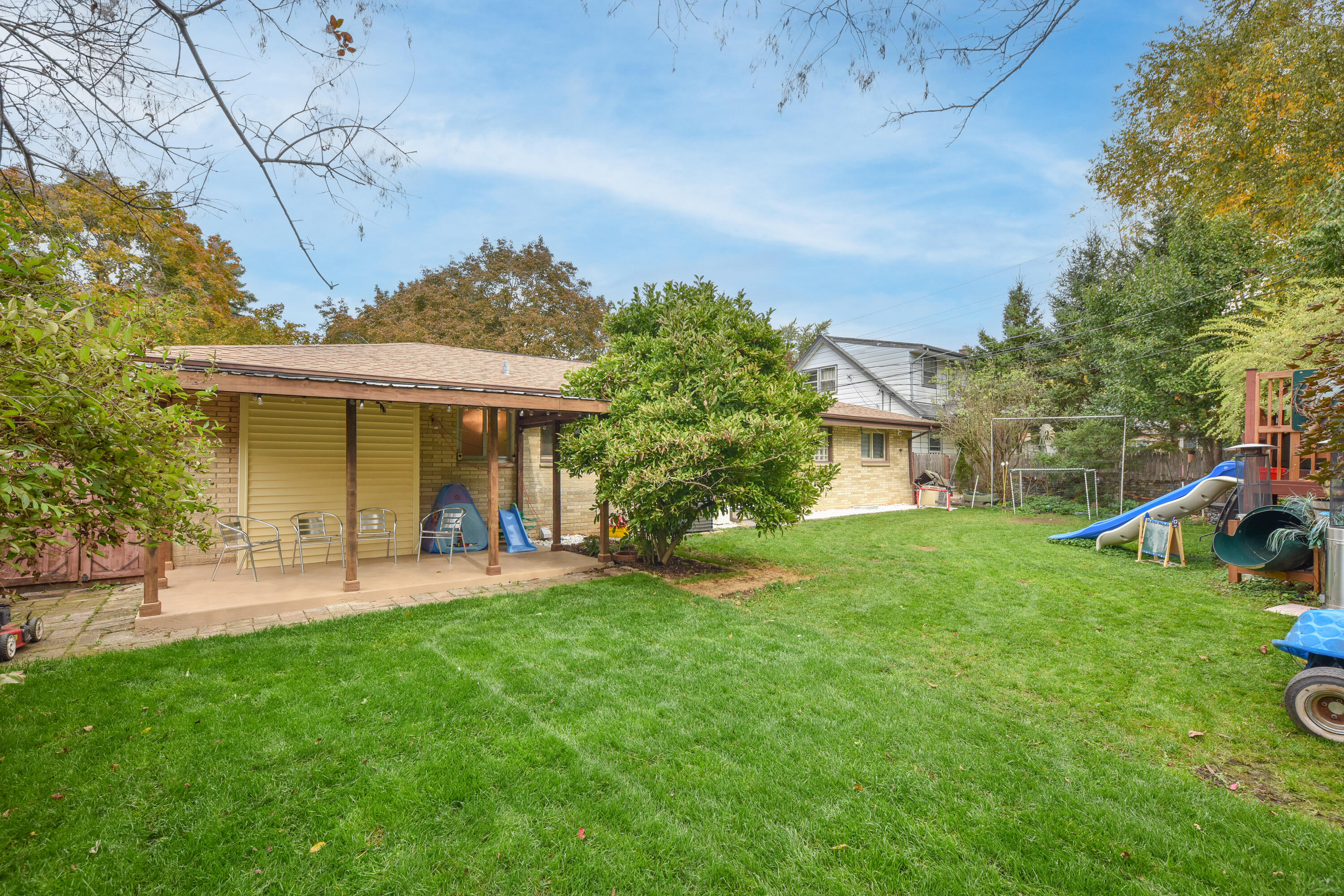 10723 West Rohr Avenue Milwaukee, WI 53225 - Photo 29 of 32 Extrerior View and Yard