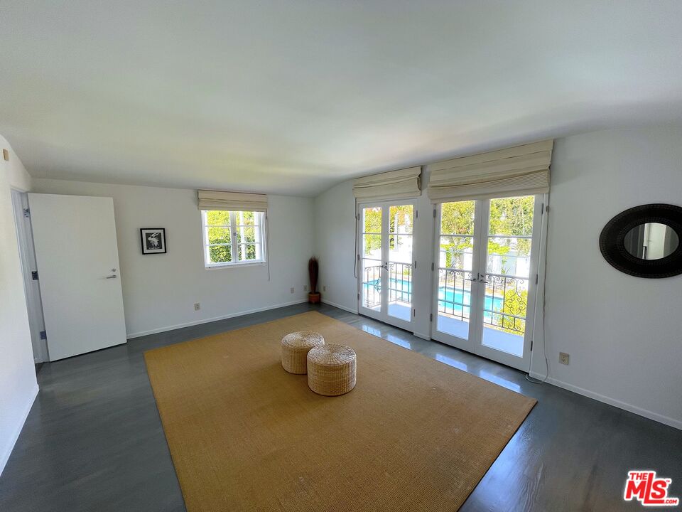 710 Walden Drive Beverly Hills, CA 90210 - Photo 11 of 20 a view of an empty room with a window