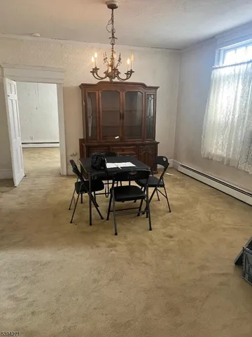 a view of a livingroom with furniture and window