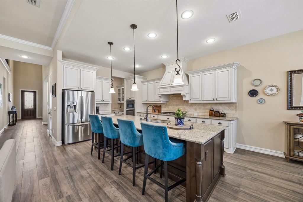948 Holt Lane Allen, TX 75013 - Photo 9 of 40 Beautiful wood-like tile flooring throughout