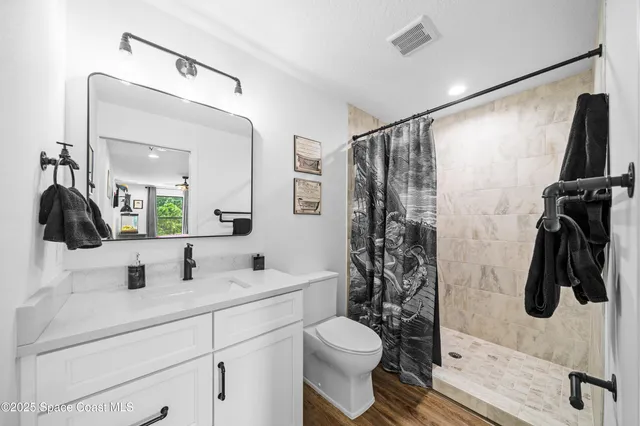 a dining room with furniture window and outside view