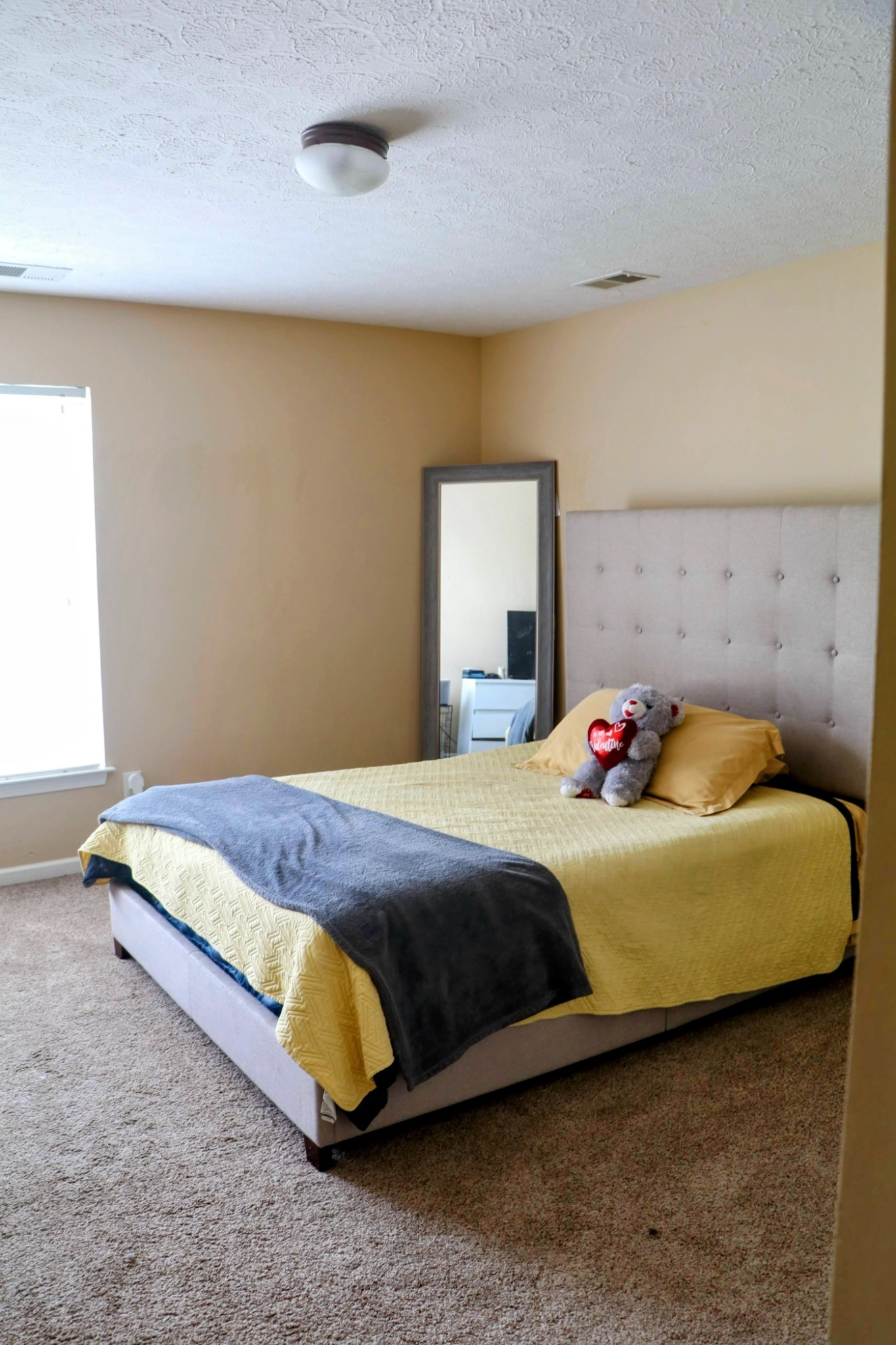 1660 Comanche Run Madison, TN 37115 - Photo 19 of 28 a bedroom with a bed and lamp