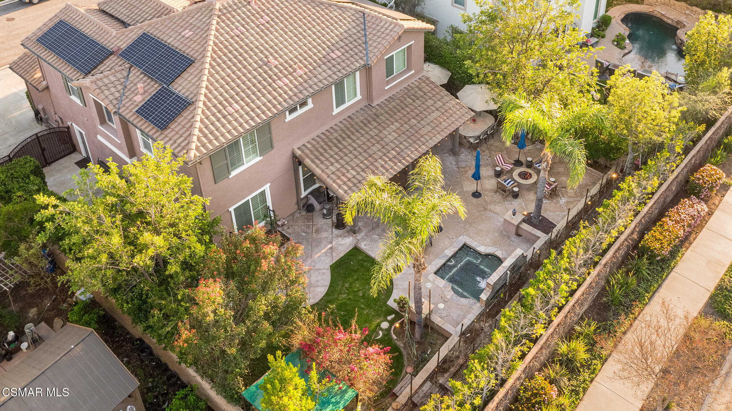 5019 Corral Street Simi Valley, CA 93063 - Photo 36 of 50 a aerial view of a house with a yard and garden