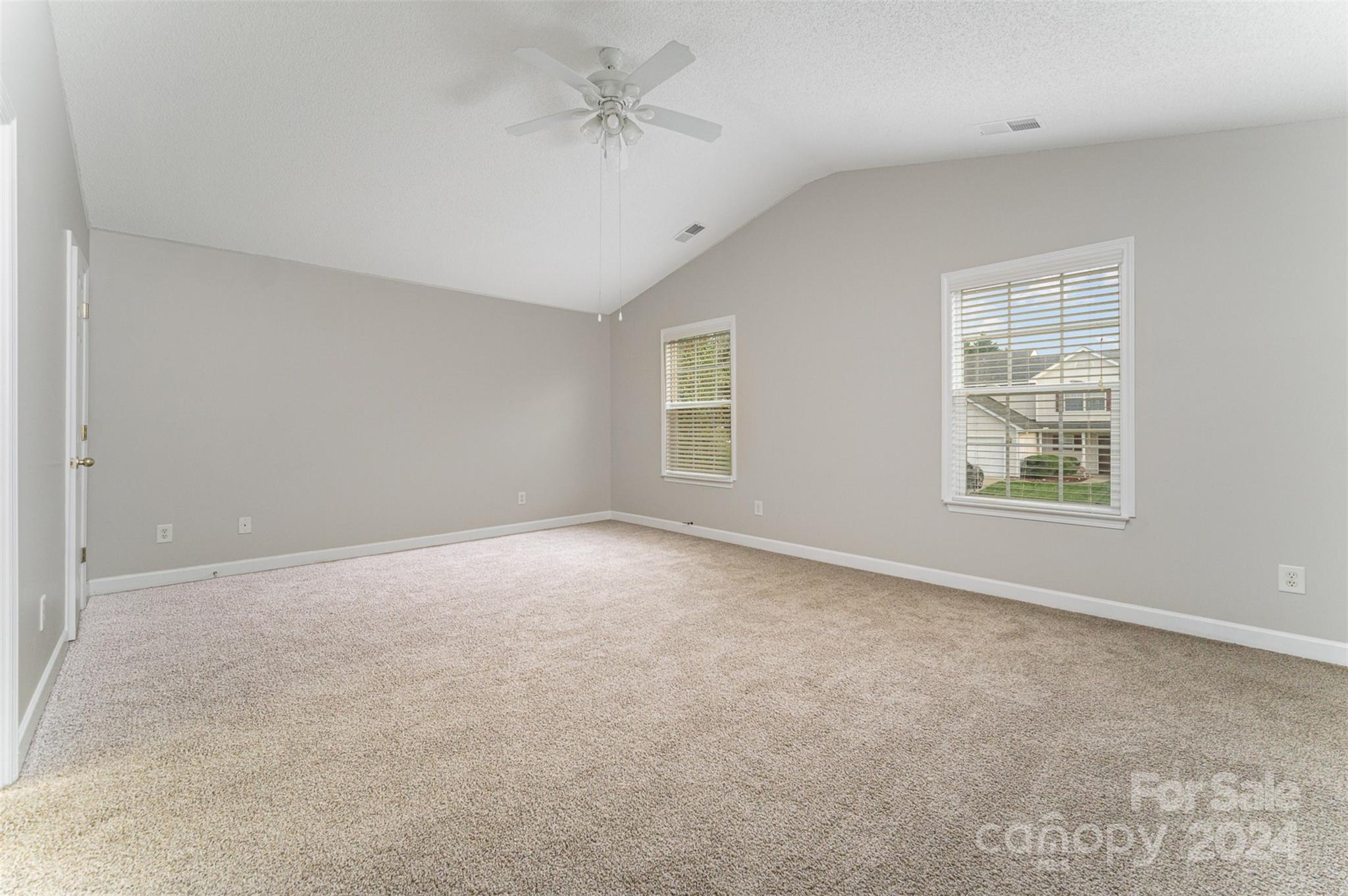 5018 Revelation Way Monroe, NC 28110 - Photo 10 of 19 a view of an empty room with a window