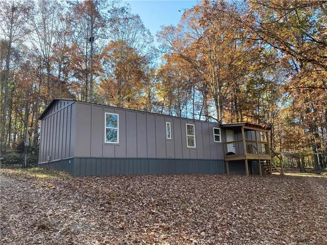 a house with a tree in front of it