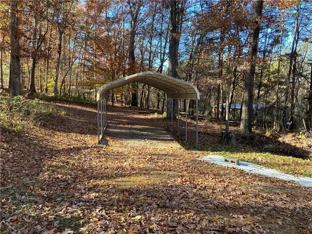 a kitchen with a refrigerator stove and cabinets