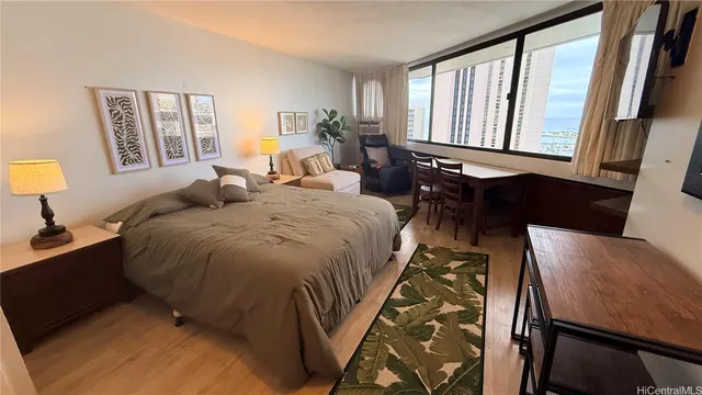 a bed room with a bed and a lamp