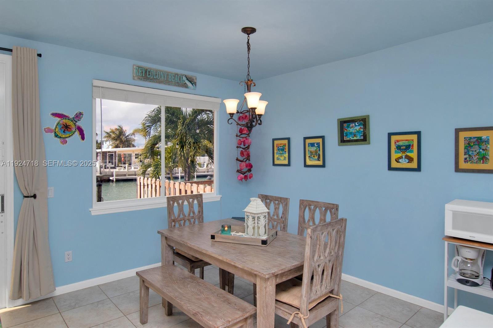 461 3rd Street Key Colony Beach, FL 33051 - Photo 13 of 79 a workspace with furniture window and outside view