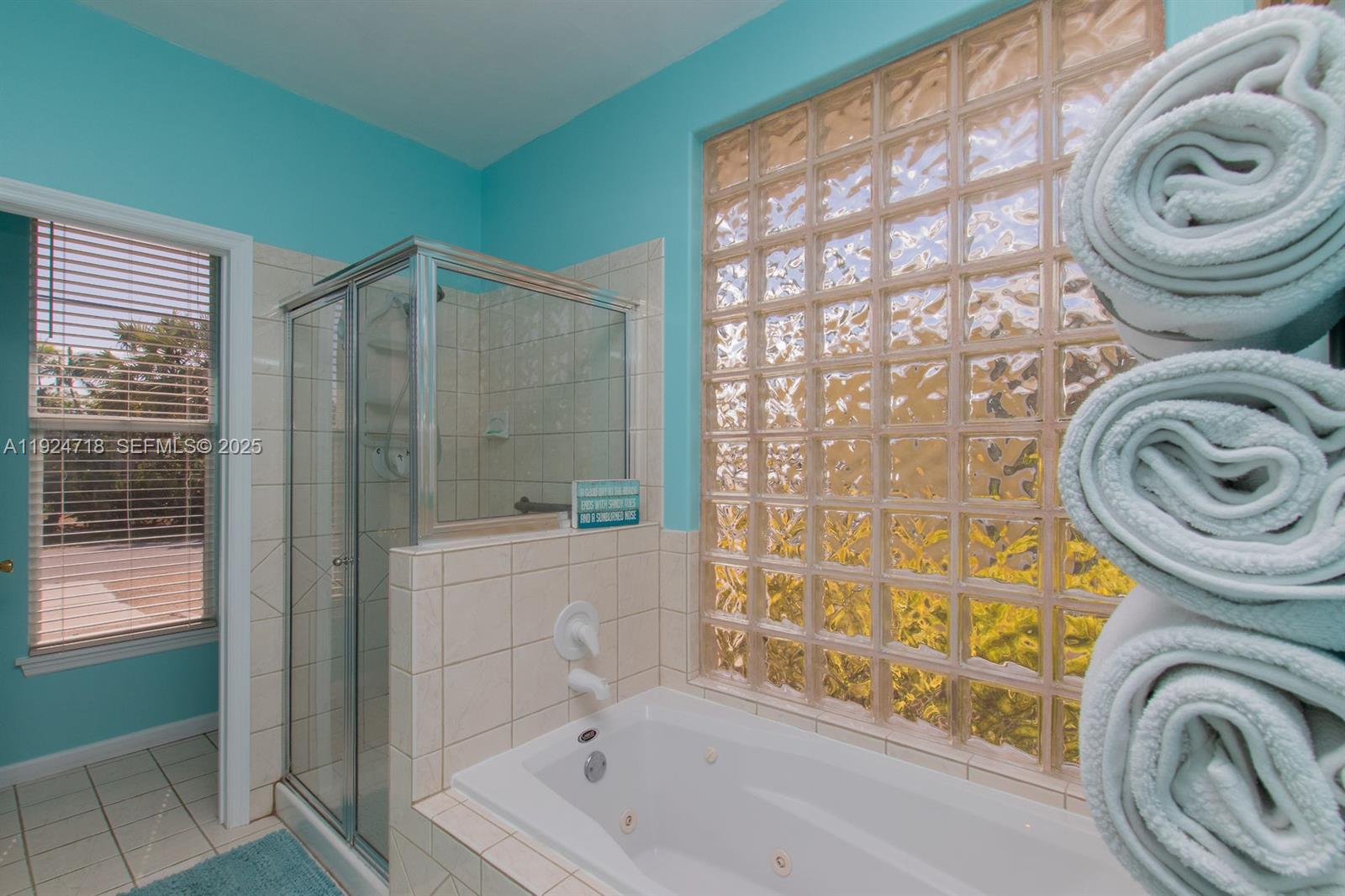 461 3rd Street Key Colony Beach, FL 33051 - Photo 23 of 79 a bathroom with a sink a toilet and a shower