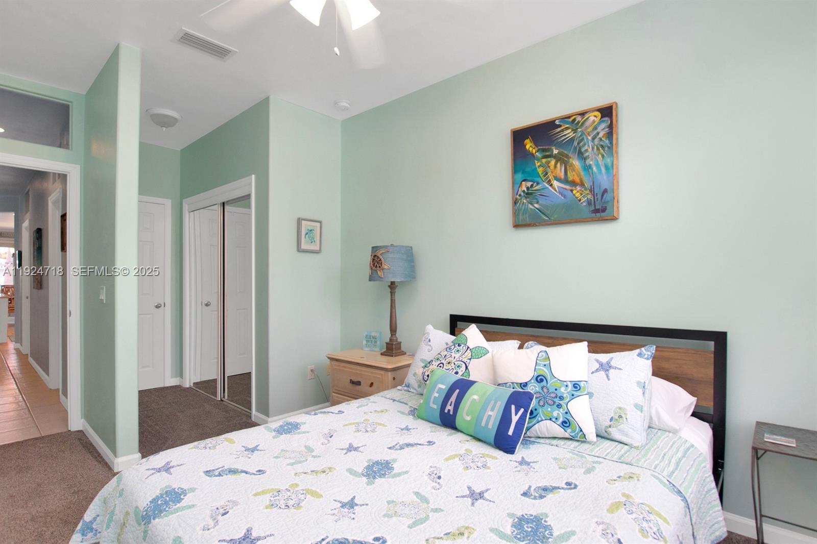 461 3rd Street Key Colony Beach, FL 33051 - Photo 30 of 79 a bedroom with bed and cupboard