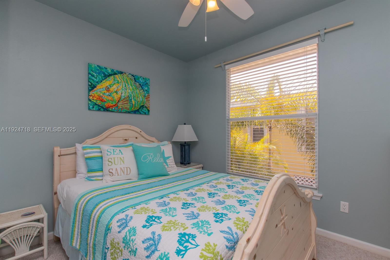 461 3rd Street Key Colony Beach, FL 33051 - Photo 32 of 79 a bedroom with a bed and a painting on the wall