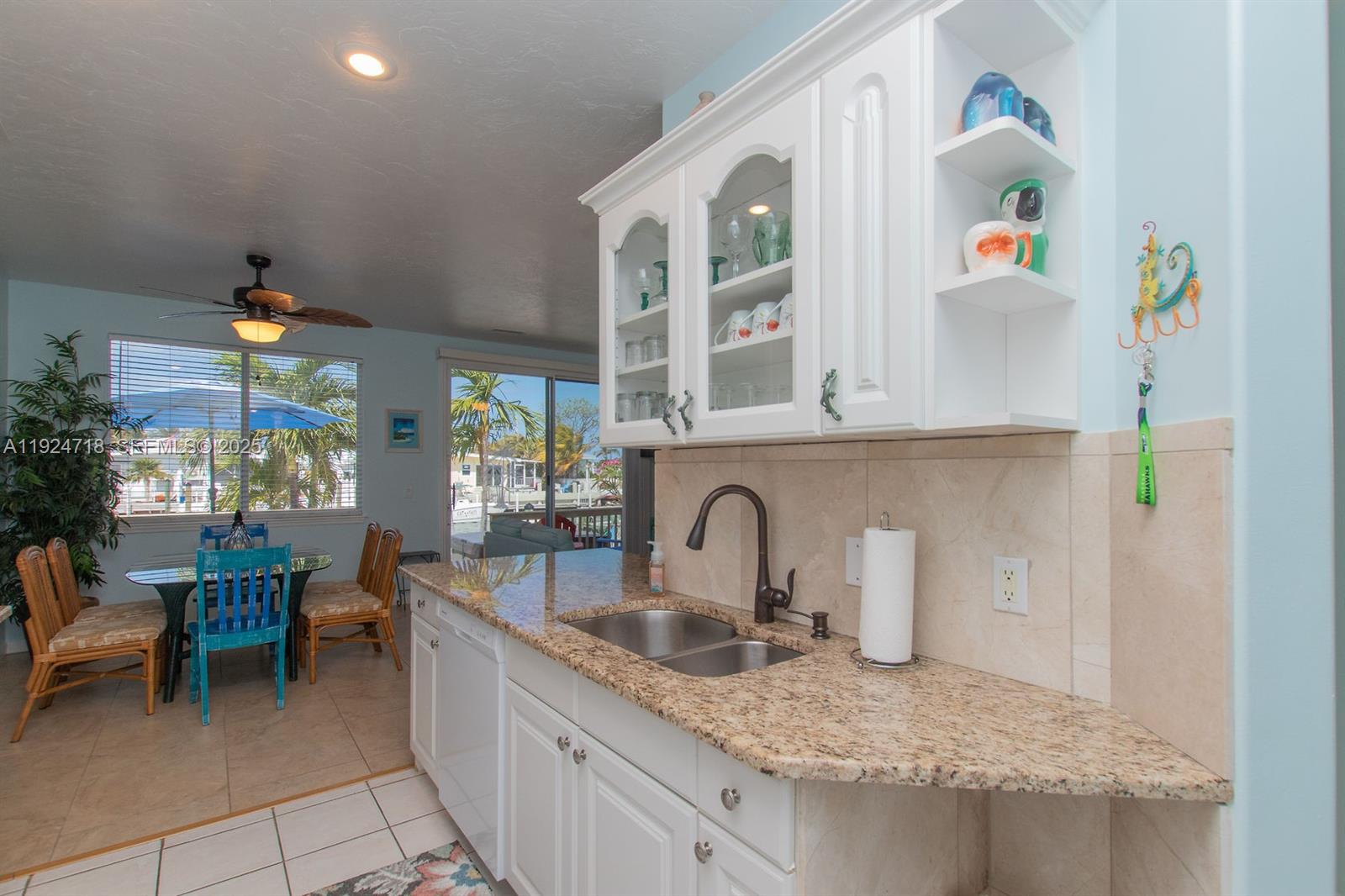 461 3rd Street Key Colony Beach, FL 33051 - Photo 55 of 79 a kitchen with a sink and cabinets
