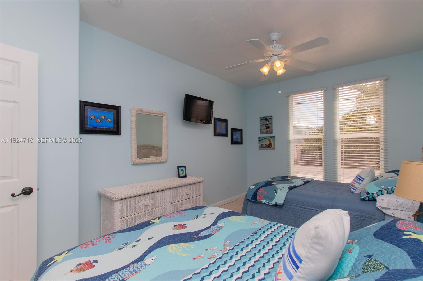 461 3rd Street Key Colony Beach, FL 33051 - Photo 68 of 79 a bedroom with a bed and a couch