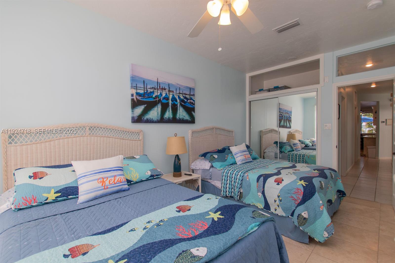 461 3rd Street Key Colony Beach, FL 33051 - Photo 69 of 79 a bedroom with two beds and a chandelier