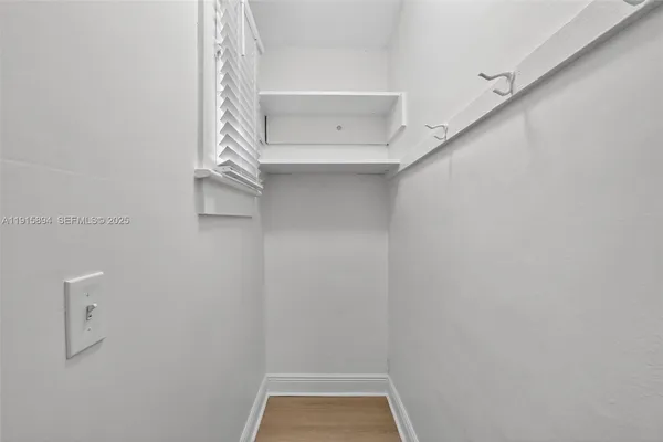 a bathroom with a toilet a sink and bathtub