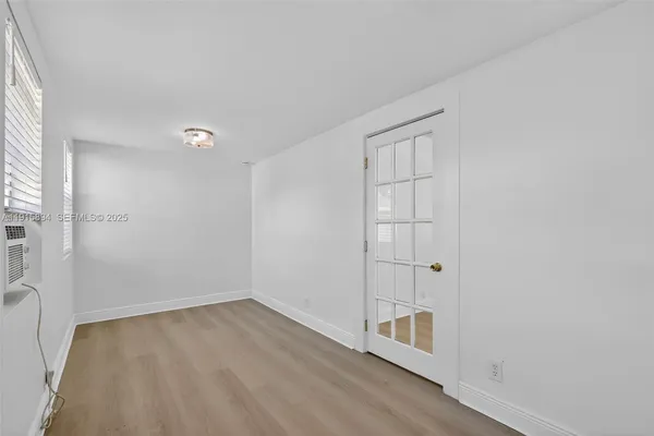a bathroom with a sink and shower
