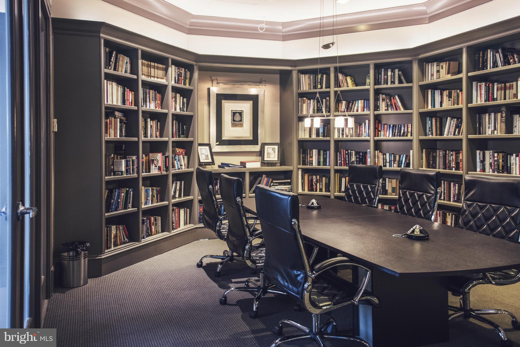 851 North Glebe Road, Unit 501 Arlington, VA 22203 - Photo 25 of 30 a view of a workspace with furniture and a bookshelf