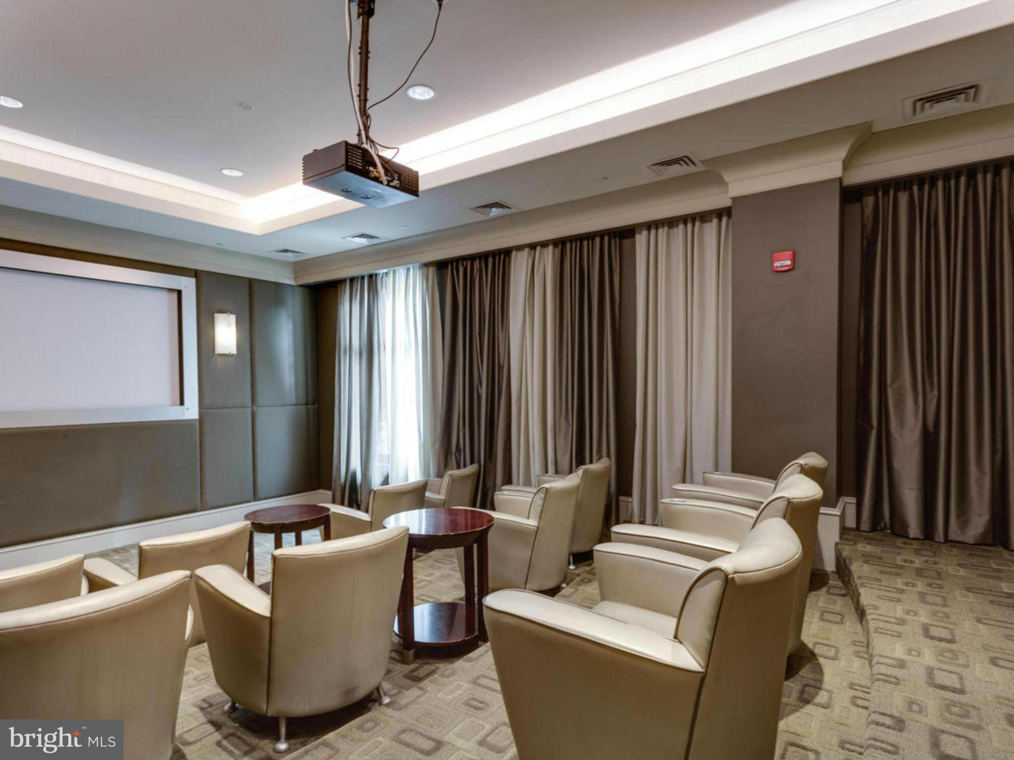 851 North Glebe Road, Unit 501 Arlington, VA 22203 - Photo 26 of 30 a living room with furniture and a window