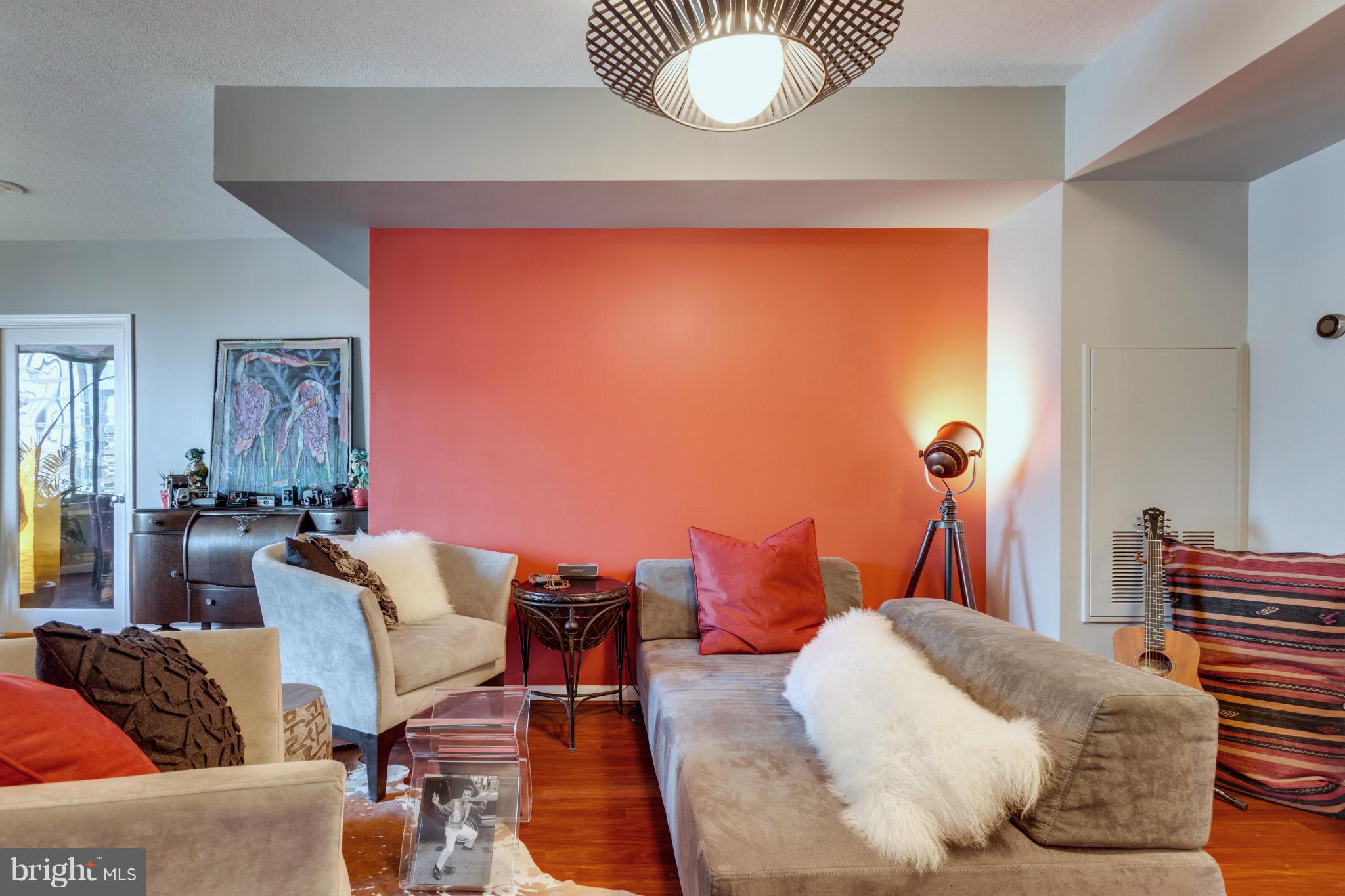851 North Glebe Road, Unit 501 Arlington, VA 22203 - Photo 7 of 30 a bedroom with furniture and a large mirror