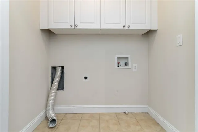 a view of cabinets and wooden floor