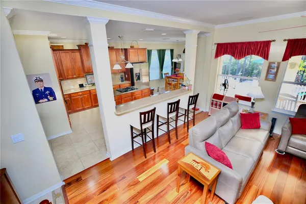 a kitchen with stainless steel appliances granite countertop a stove a sink dishwasher and a microwave