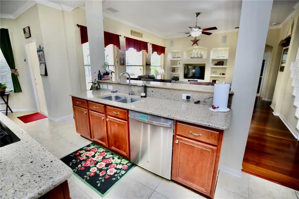 a bedroom with bed and wooden floor