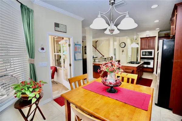 a bathroom with a sink vanity and a mirror