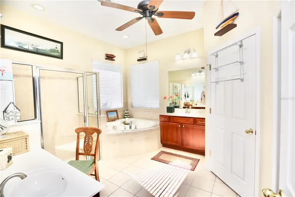 a view of a house with backyard porch and furniture