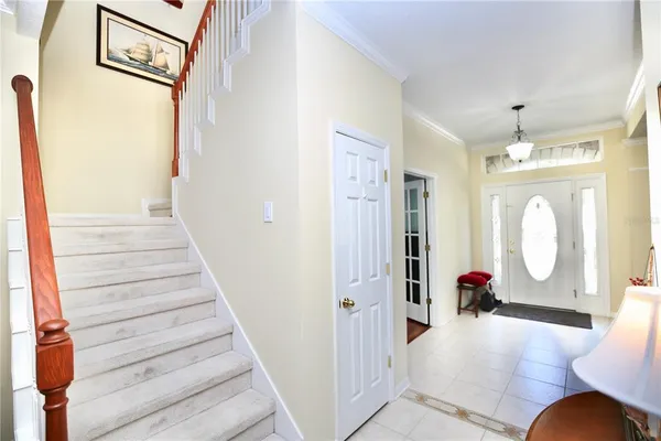 a view of dining room with furniture window and wooden floor