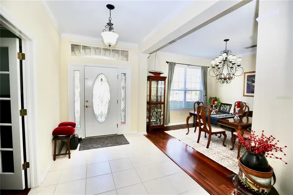 a view of a livingroom with furniture and a window