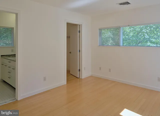 an empty room with windows