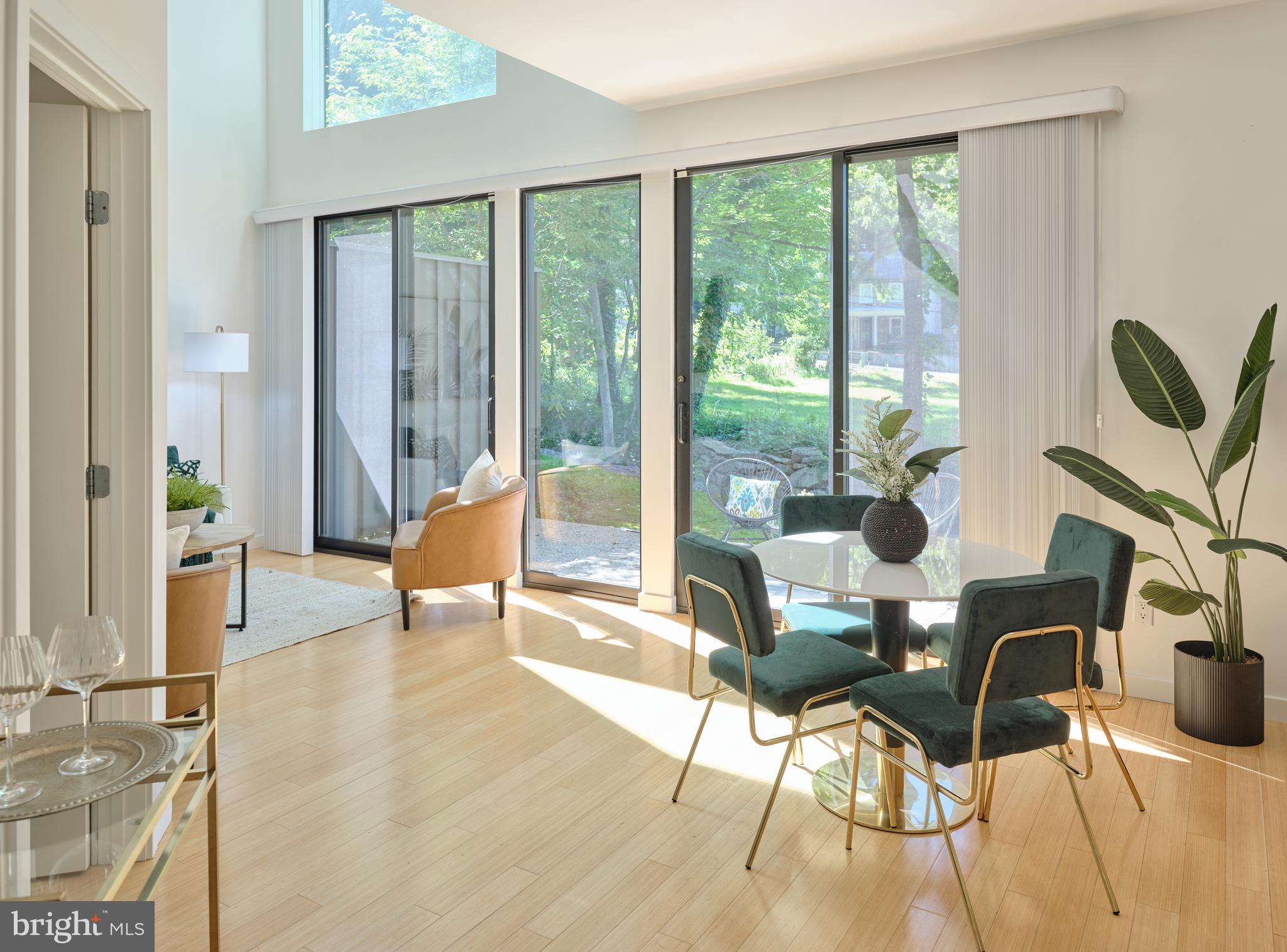 7189 Centerbridge Road New Hope, PA 18938 - Photo 21 of 48 a living room filled with furniture and a floor to ceiling window