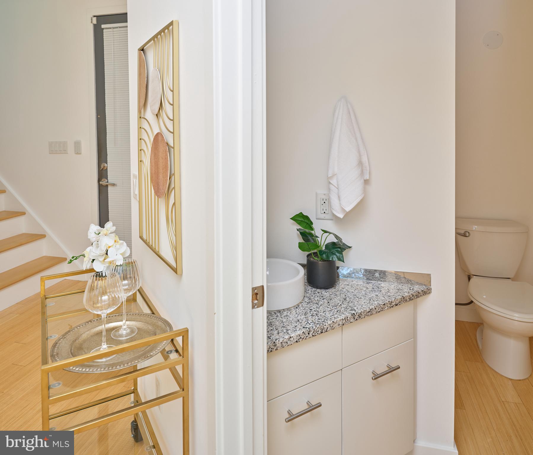 7189 Centerbridge Road New Hope, PA 18938 - Photo 29 of 48 a bathroom with a granite countertop sink a toilet and mirror
