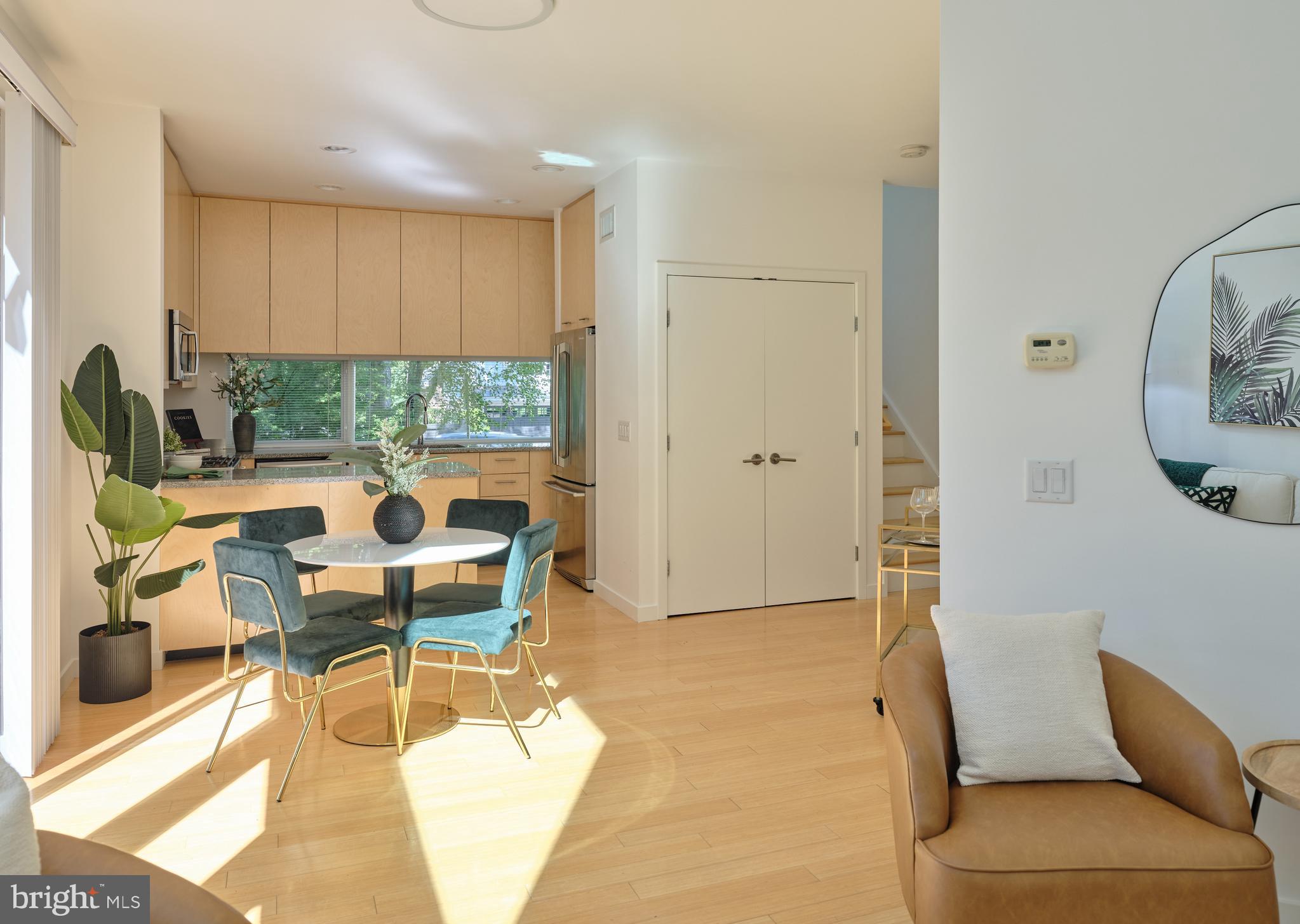 7189 Centerbridge Road New Hope, PA 18938 - Photo 30 of 48 a living room with furniture a rug and a floor to ceiling window