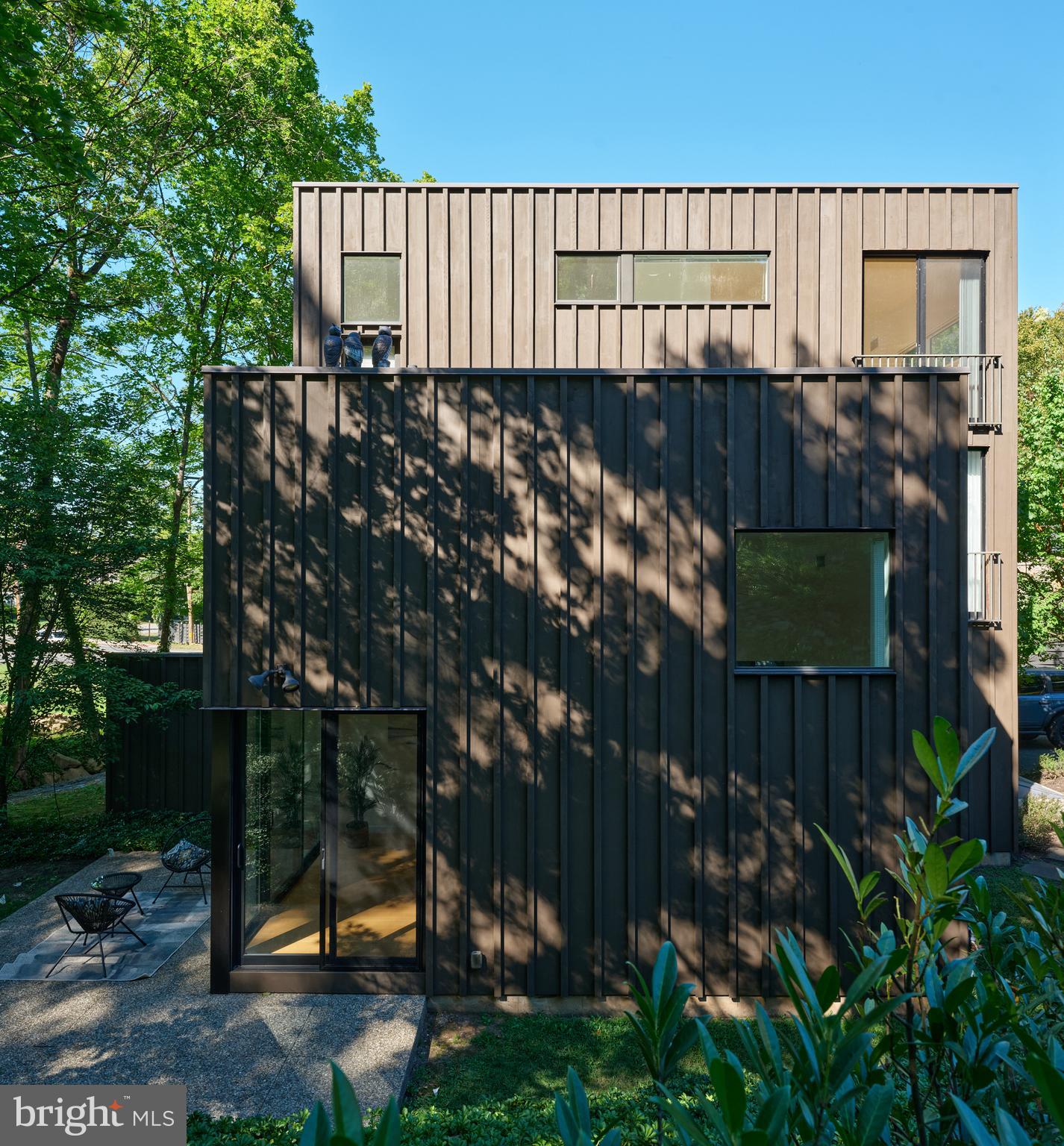 7189 Centerbridge Road New Hope, PA 18938 - Photo 45 of 48 a view of a backyard with plants and wooden fence