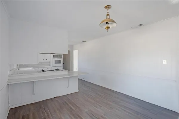 a room with a sink and a window