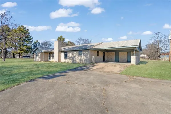 a front view of house with yard